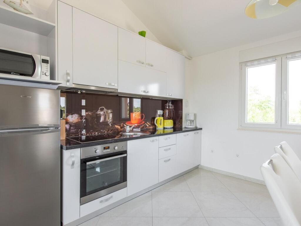 Apartmani Velic Vir Exterior foto